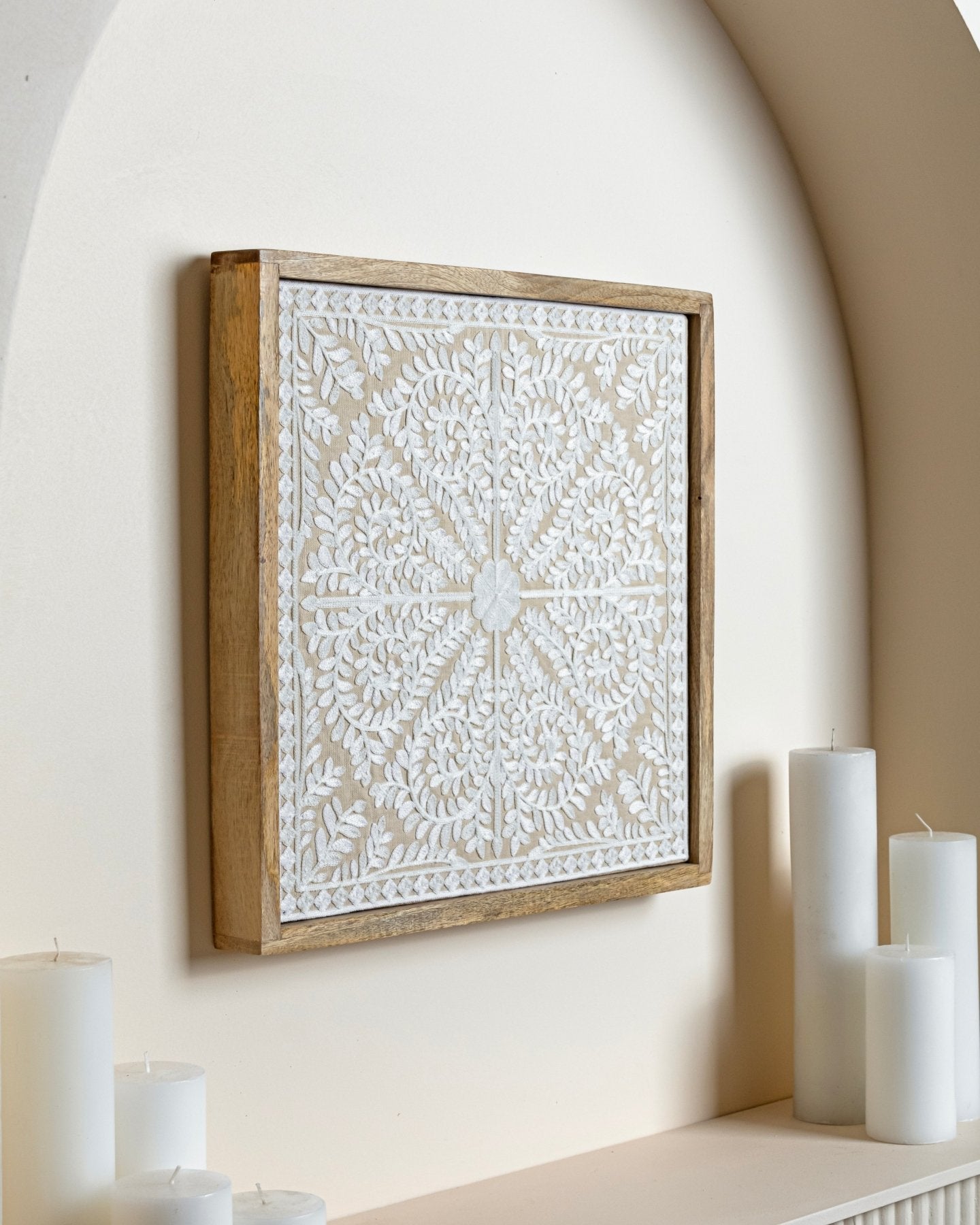 Ivory Framed Suzani Textile 16x16" - Marble Lotus - This stunning white wooden wall art, inspired by traditional Suzani textiles, will add texture and elegance to any room. Buy now at Marble Lotus.