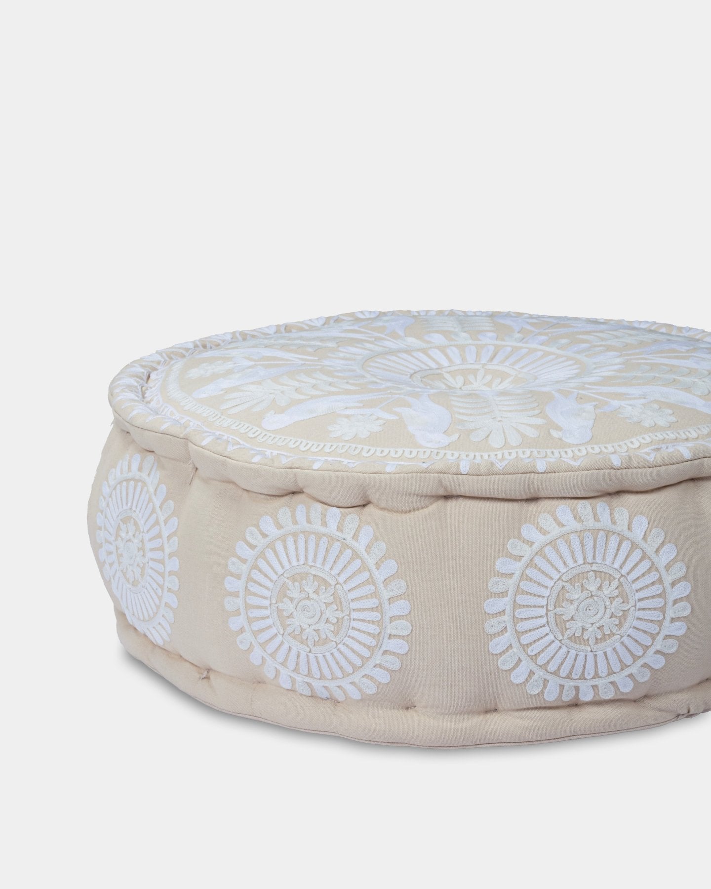 Ivory Suzani Pouf Fauna - Marble Lotus - White Suzani Pouf Ottoman Fauna. Get it now.