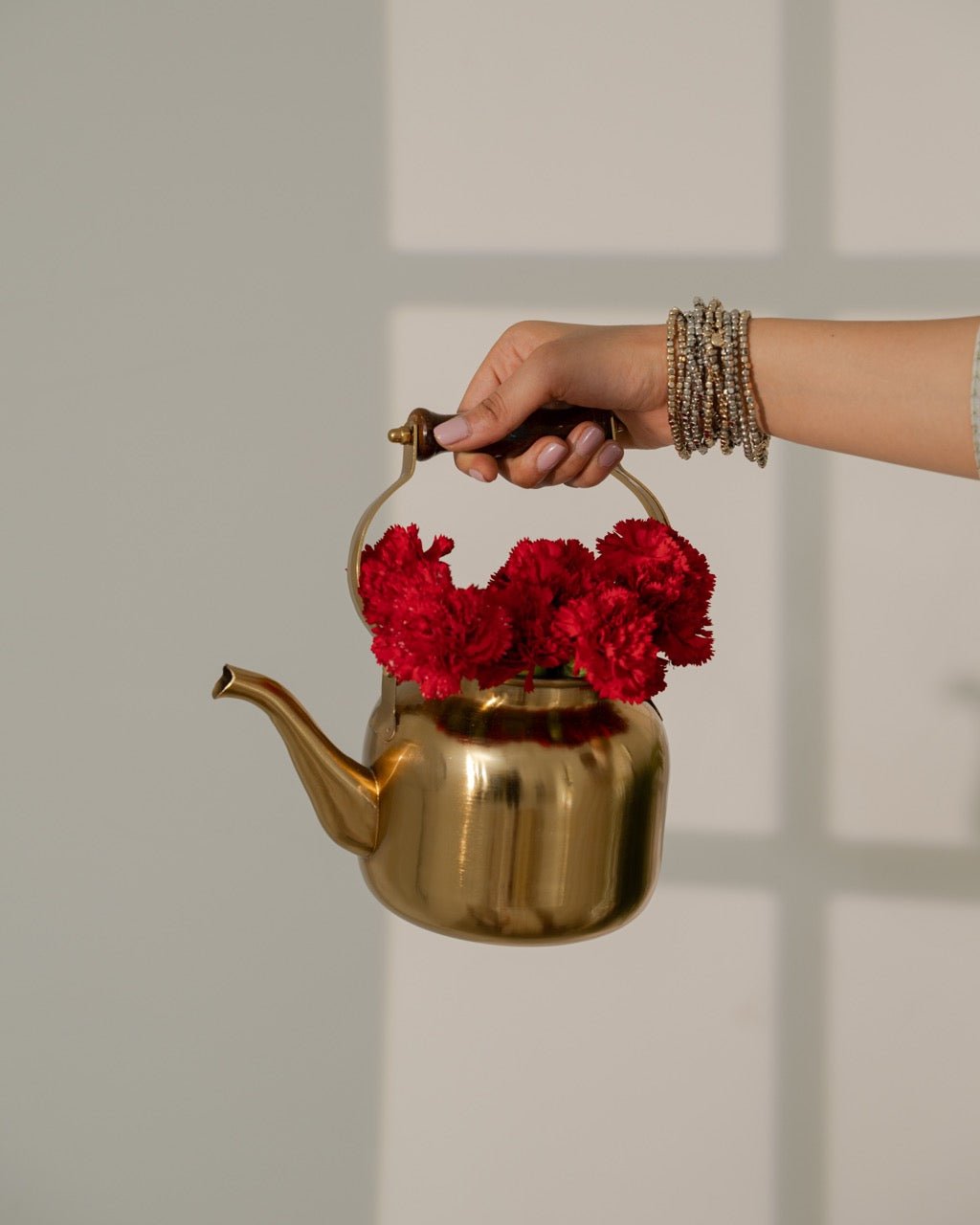 Matte Gold Tea Kettle with Wooden Handle - Marble Lotus - Enjoy tea in style with the elegant Stainless Steel Gold Tea Kettle. Shop now at Marble Lotus